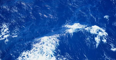 Why Is the Ocean Blue? The Water Absorbs Red Light, Not the Sky